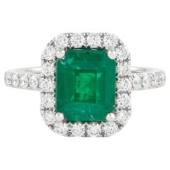 GIA 2.90ctt Emerald and Diamond Halo Ring 18k Gold