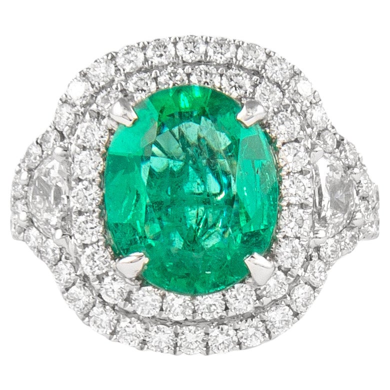 Alexander 4.36ctt Emerald with Diamond Three Stone Halo Ring 18 Karat Gold