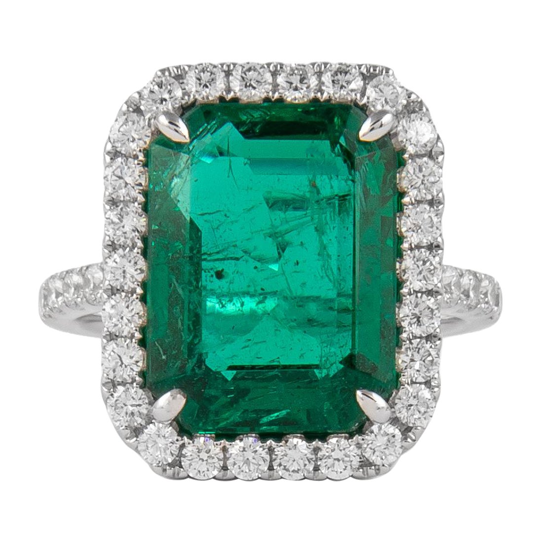 Alexander GIA certified 7.29 Carat Emerald with Diamond Halo Ring 18 Karat Gold