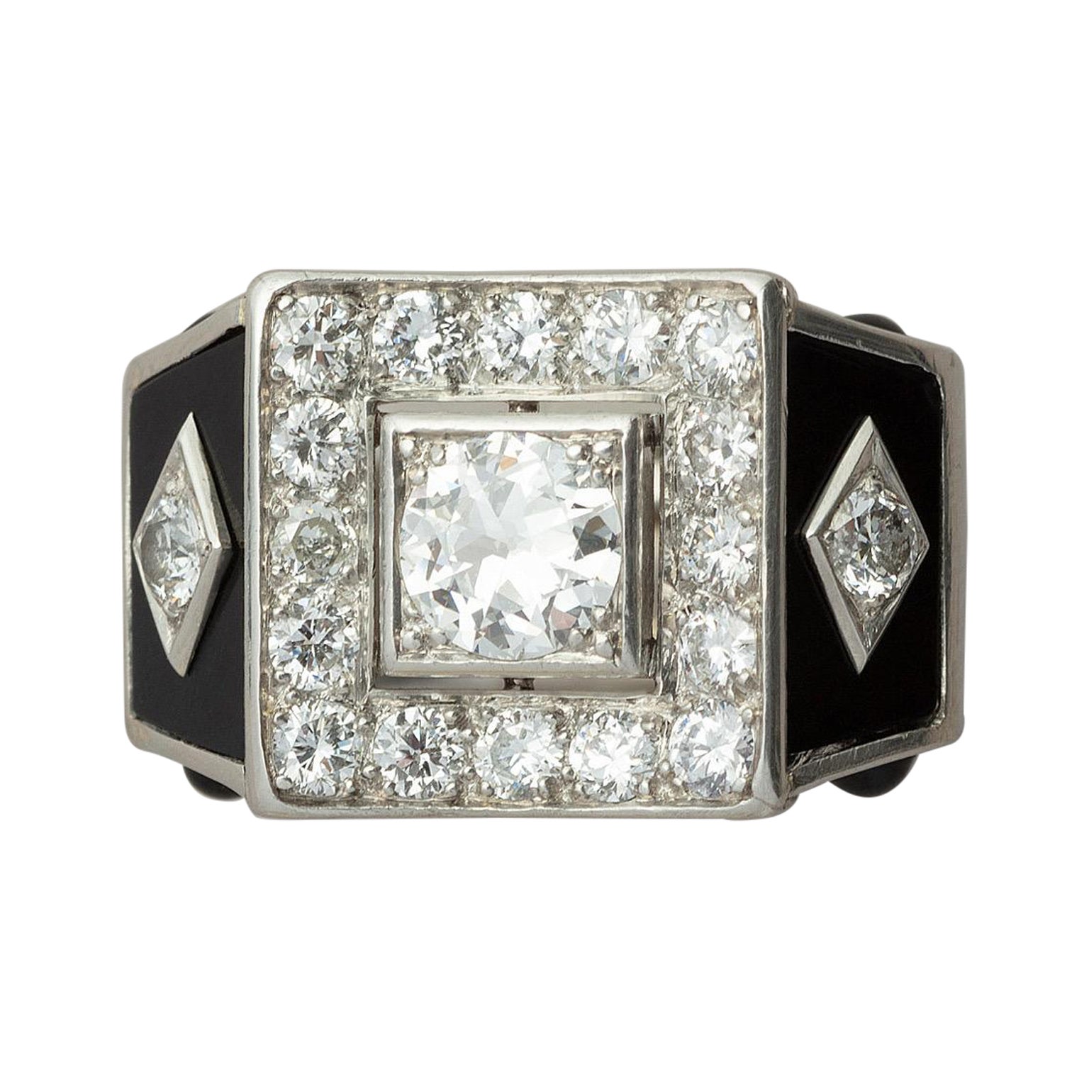 Retro Platinum Diamond and Onyx Ring For Sale