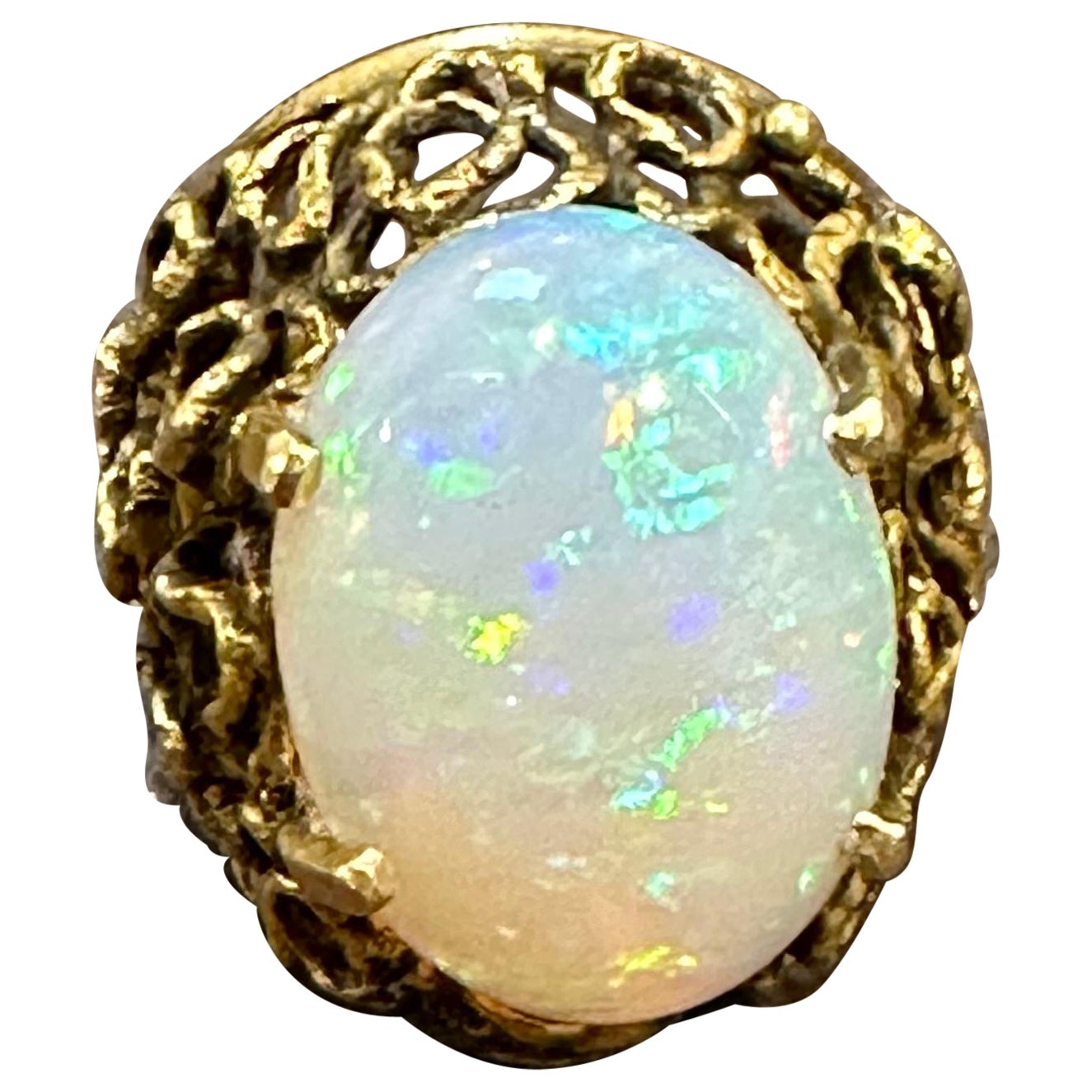 Vintage 11 Carat Oval Shape Ethiopian Opal Cocktail Ring 14kt Yellow Gold Ring For Sale