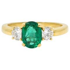 1990's 1.60 CTW Oval Cut Zambian Emerald Diamond 18 Karat Yellow Gold Ring 