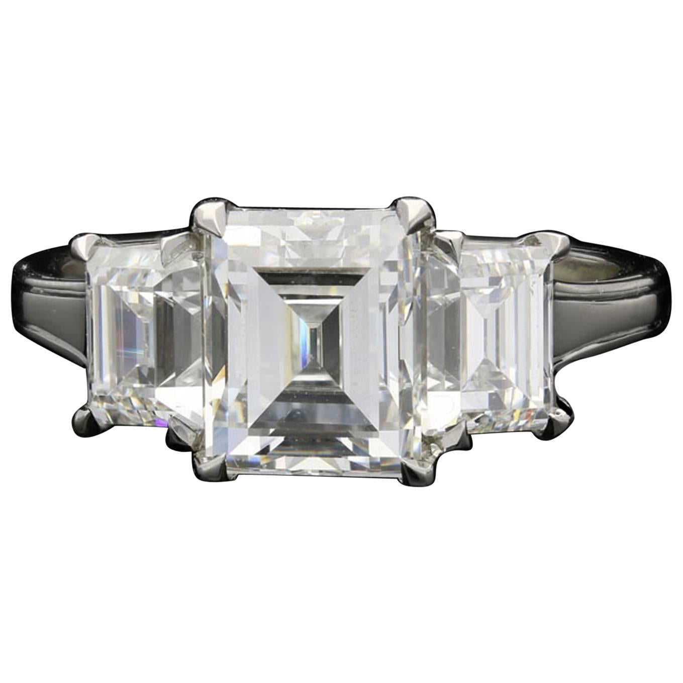 An Elegant 3.63 Carat Three Stone Step-Cut Diamond And Platinum Ring By Hancocks