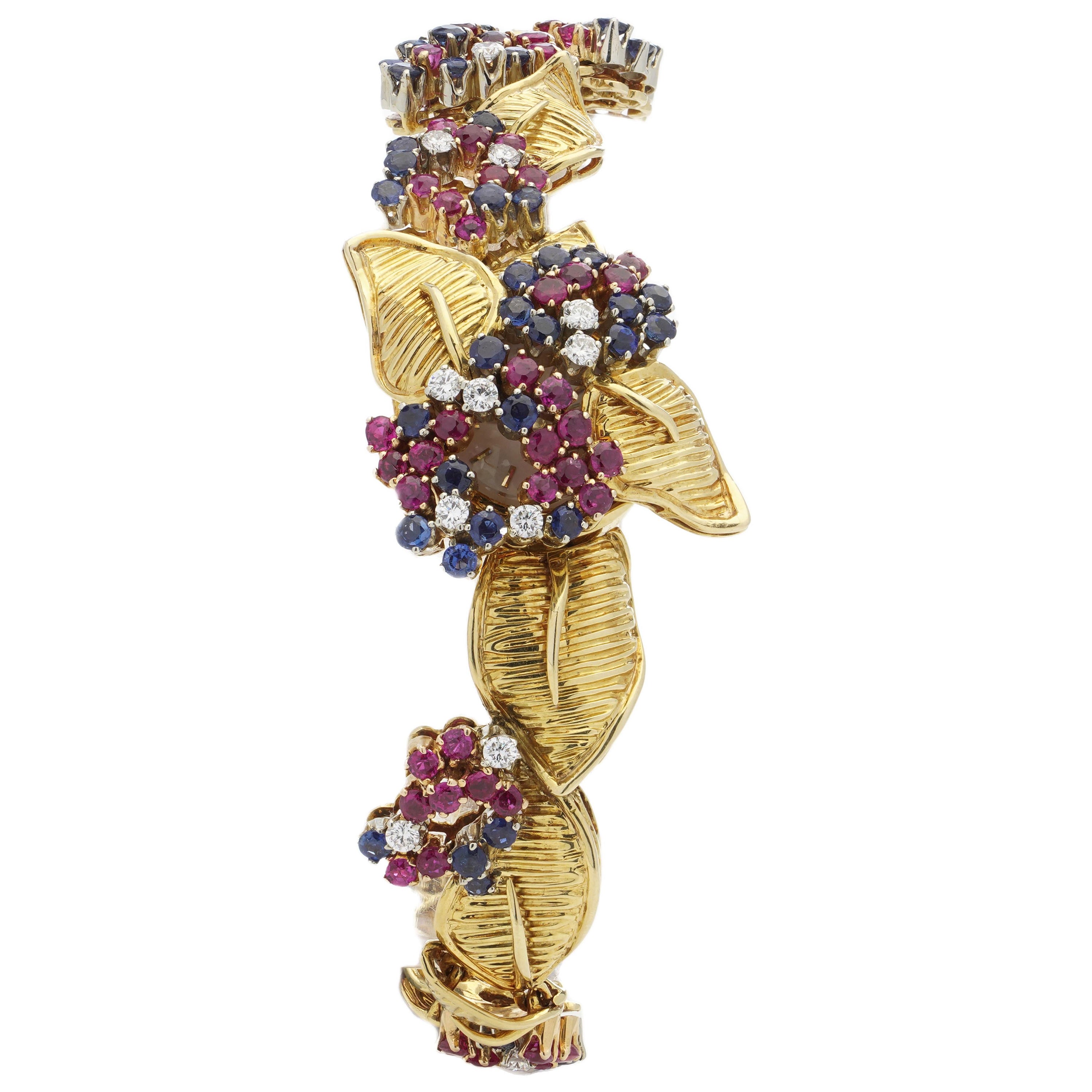 Gübelin Vintage Montre-bracelet en or jaune 18 carats, saphir, rubis et diamant