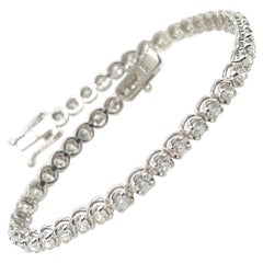 Modern Gold 2.42 Carat Natural Round Brilliant Colorless Diamond Tennis Bracelet