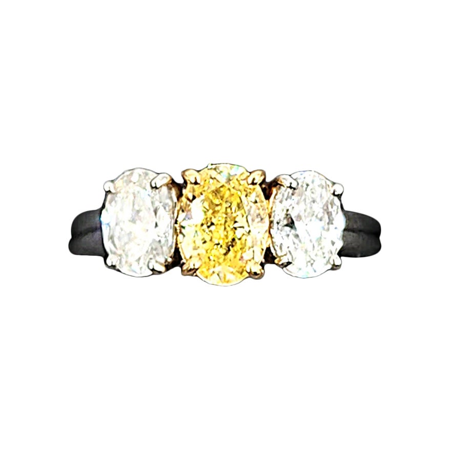 2.21 ct GIA Certified Three-Stone Oval Yellow & White Diamond Ring