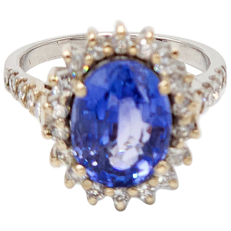 Gia Certified 4.99 Carat Ceylon Blue Sapphire Ring with Diamonds in 18k Gold For Sale