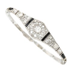 Art Deco 18ct White Gold 2ct Old Mine Cut Diamond and Onyx Bracelet, circa 1930