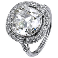 Antique GIA Certified Handmade 6.53 Carat Cushion Cut Brilliant Diamond Engagement Ring