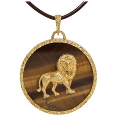 Carl F. Bucherer Leo Zodiac Tiger's Eye and 18 Karat Gold Pendant Circa 1970