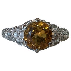 Retro Estate Orange-Yellow Sapphire and Pave Diamond Ring