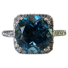 Estate Natural Blue Topaz and Diamond Halo Ring