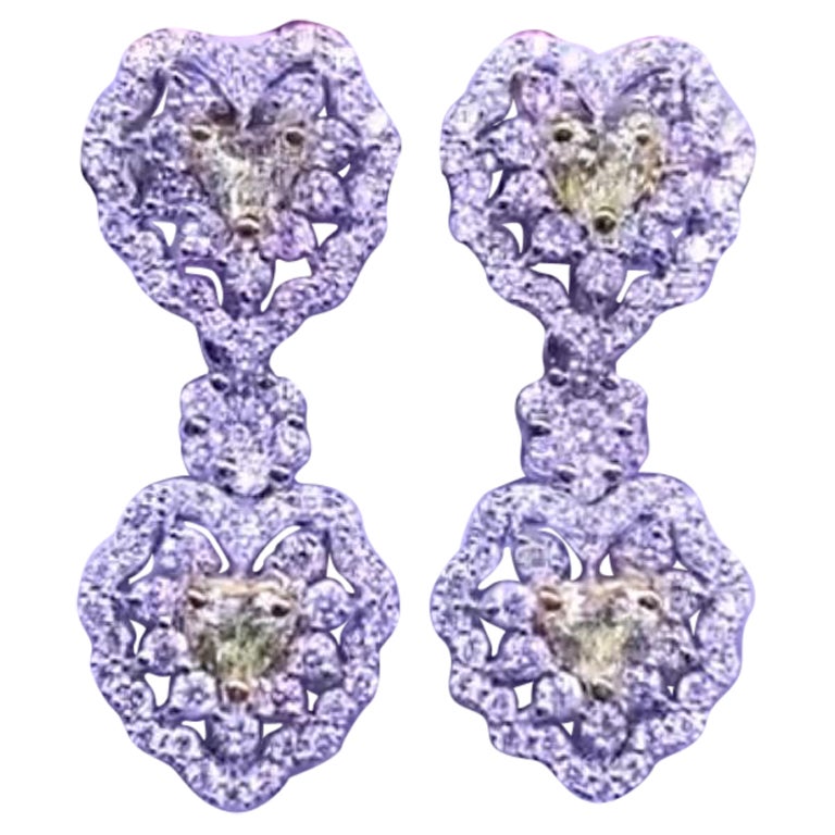 Certified 3.52 Carats Fancy Yellow Diamonds and White Diamonds 18K Gold Earrings For Sale