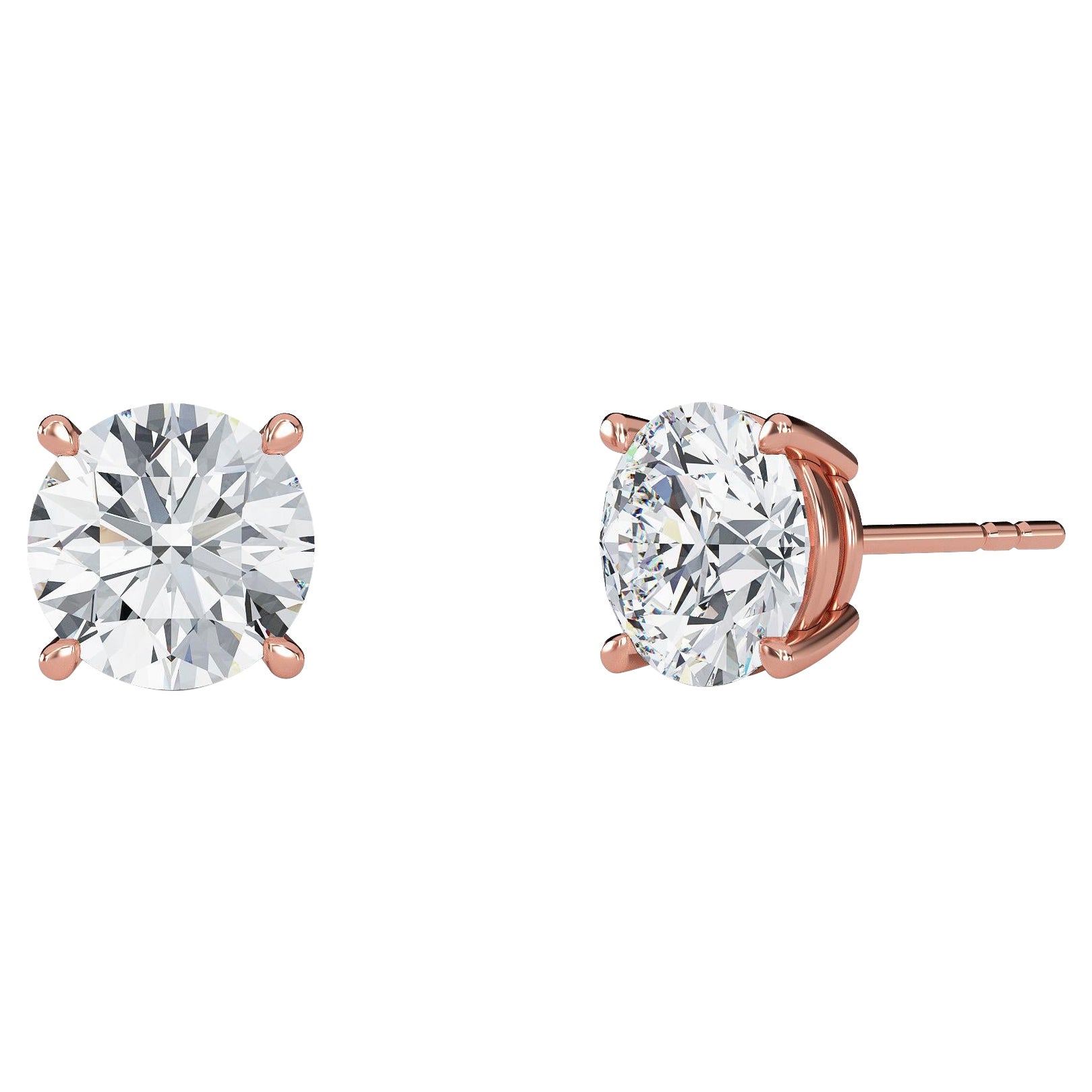 0.07 Carat TW Natural Diamond 14k Gold Four Prong Stud Earring For Sale