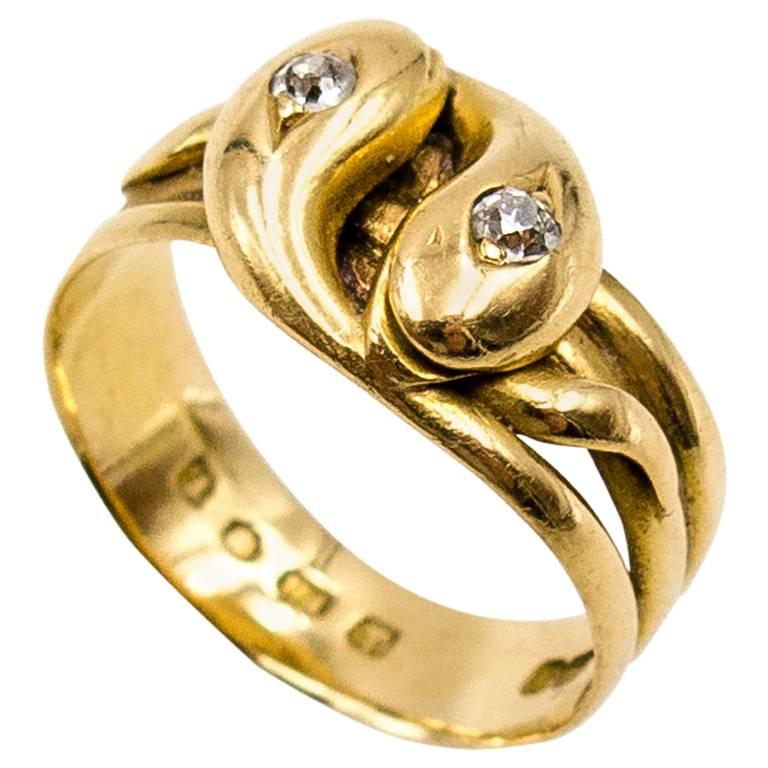 Elegant Victorian gold and diamond entwined snakes ring