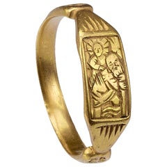 Antiker Goldring aus dem Mittelalter mit der Darstellung des Heiligen Christopherus und Christus aus Gold