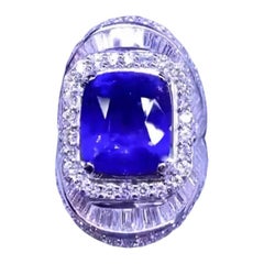 Gorgeous 12.50 Carats of Royal Blue Sapphire and Diamonds on Ring