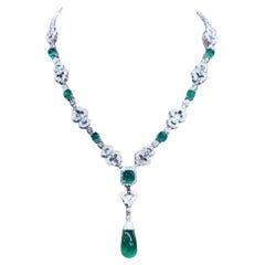 AIG certified of 33.91 Ct of emerald and 5.83 ct of diamonds on 18k gold necklac