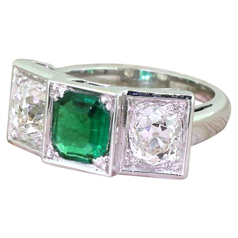 Retro 1.50 Carat Emerald and 2.50 Carat Old Cut Diamond Trilogy Ring