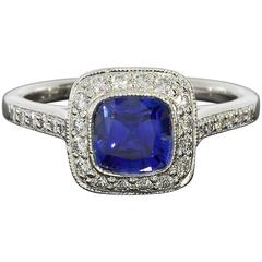 Tiffany & Co. Sapphire Diamond Platinum Legacy Halo Engagement Ring