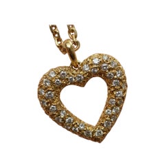 Pendentif coeur en or et diamant