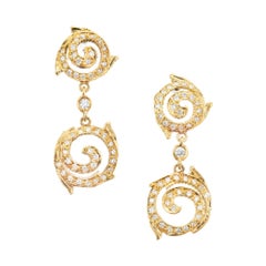 Vintage Doris Panos .90 Carat Pave Diamond Gold Swirl Dangle Earrings