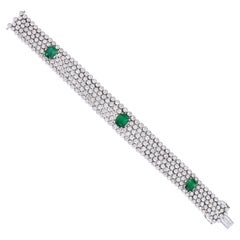 18 Karat White Gold 19.13 Carat Diamond and Emerald Contemporary Bracelet