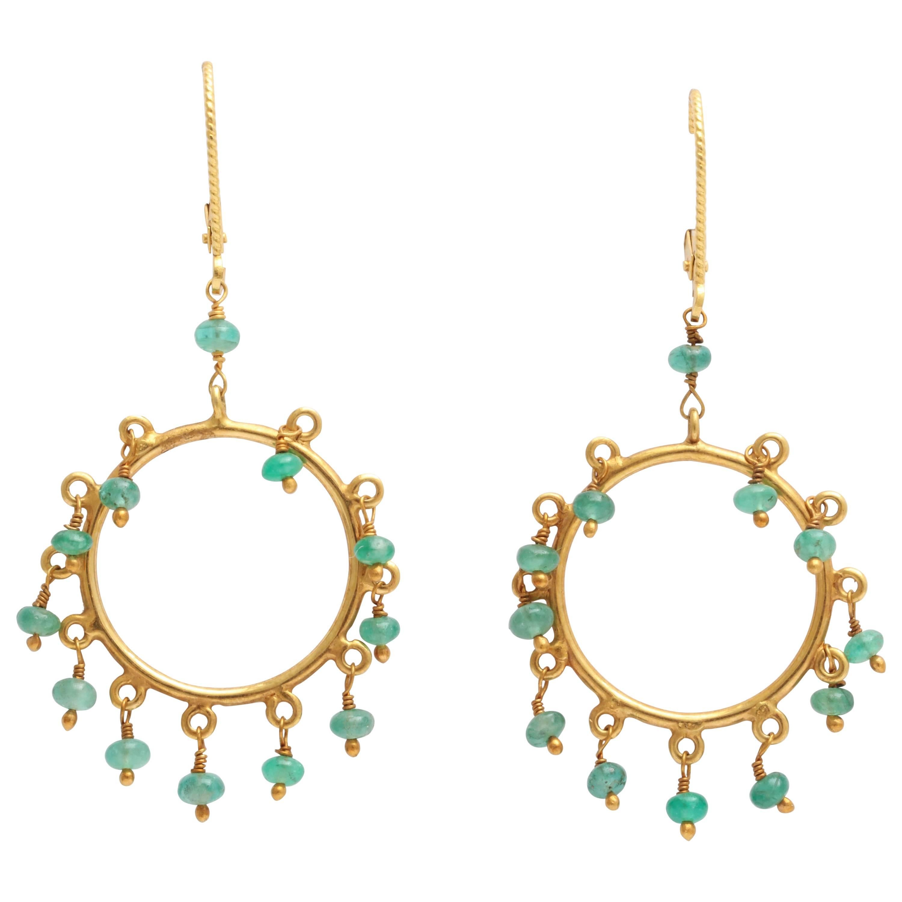 Elegant Emerald Gold Dangling Hoop Earrings For Sale