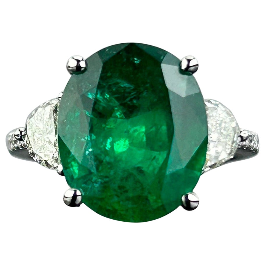 Certified 7.12 Carat Emerald and Diamond Three Stone Engagement Ring For Sale