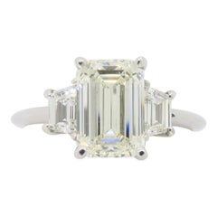Certified Emerald Cut Diamond Engagement Ring with Trapezoid Side Diamonds