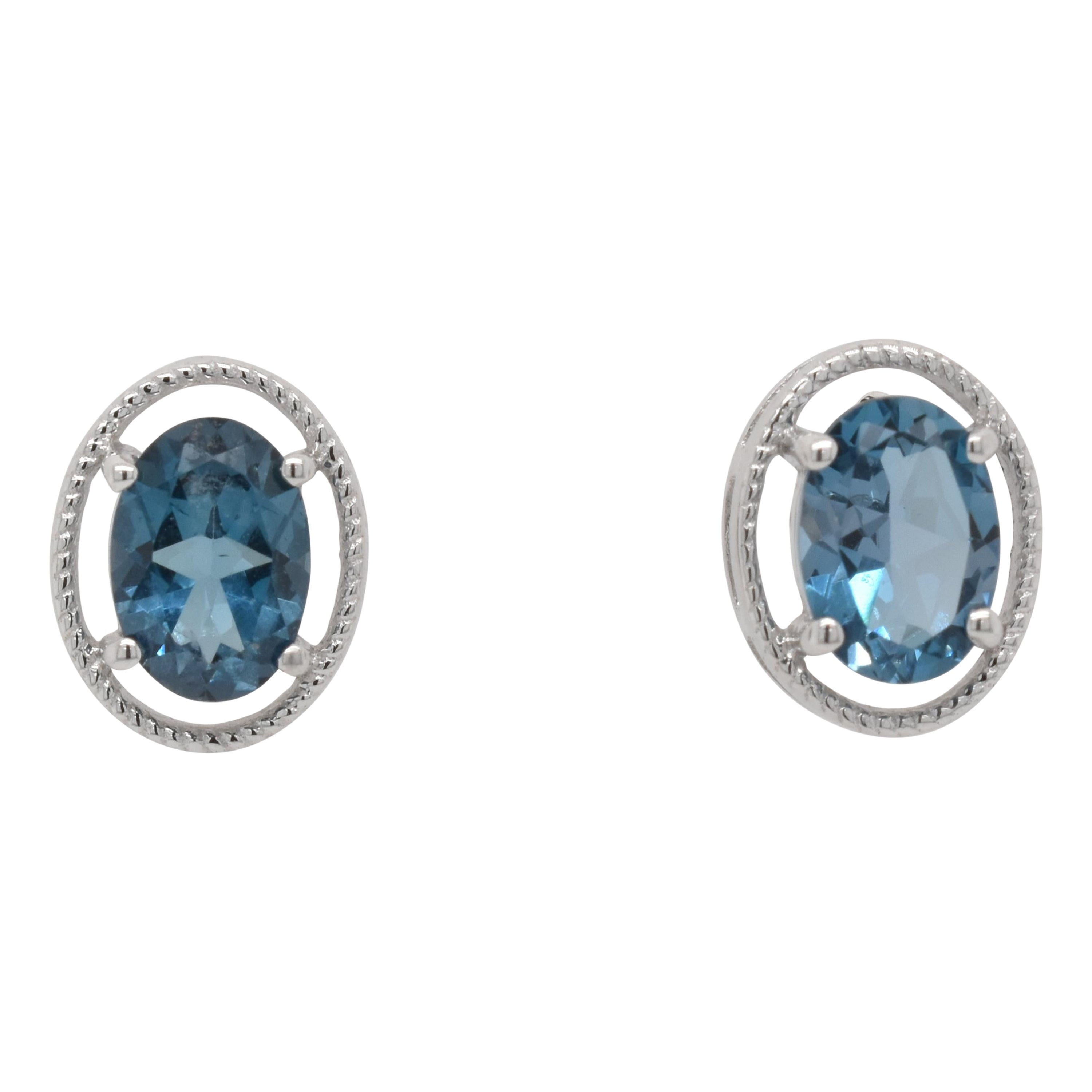 Oval  Natural London Blue Topaz  Rhodium Over Sterling Silver Earrings For Sale