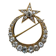 Broche ancienne du 19e siècle en or jaune avec diamant taillé dans la mine, croissant de lune et étoile