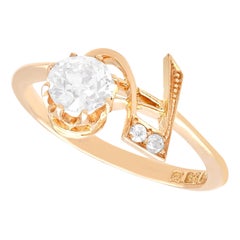 Antiker Kleidring aus 14 Karat Roségold mit 0,64 Karat Diamanten