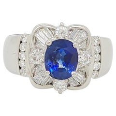 Blue Sapphire Oval and White Diamond Ring in Platinum