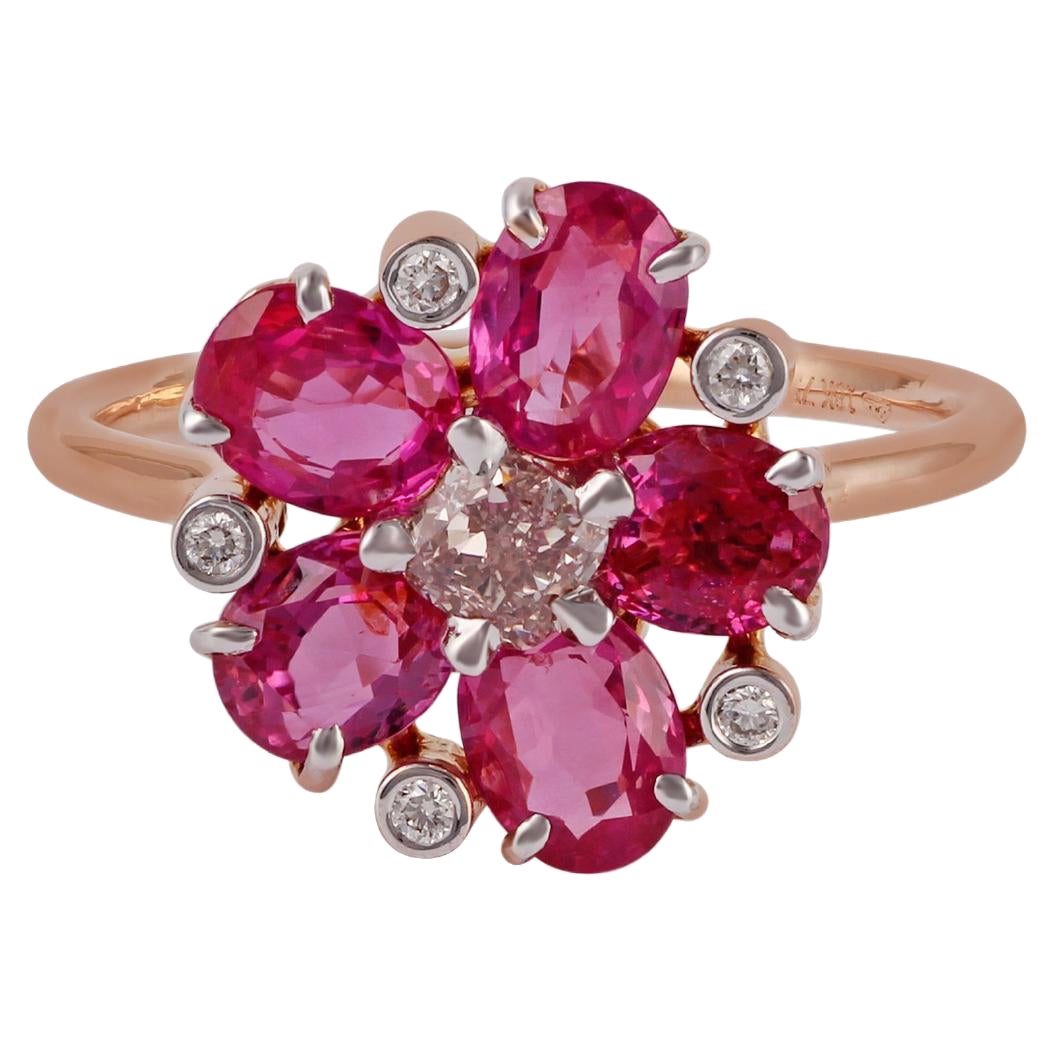 Bague en or rose 18k sertie de rubis et de diamants roses