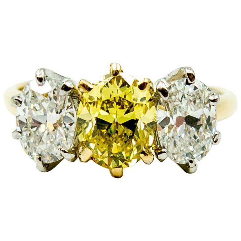 Dazzling GIA Cert Natural Color Fancy Intense Yellow Diamond Three Oval Ring