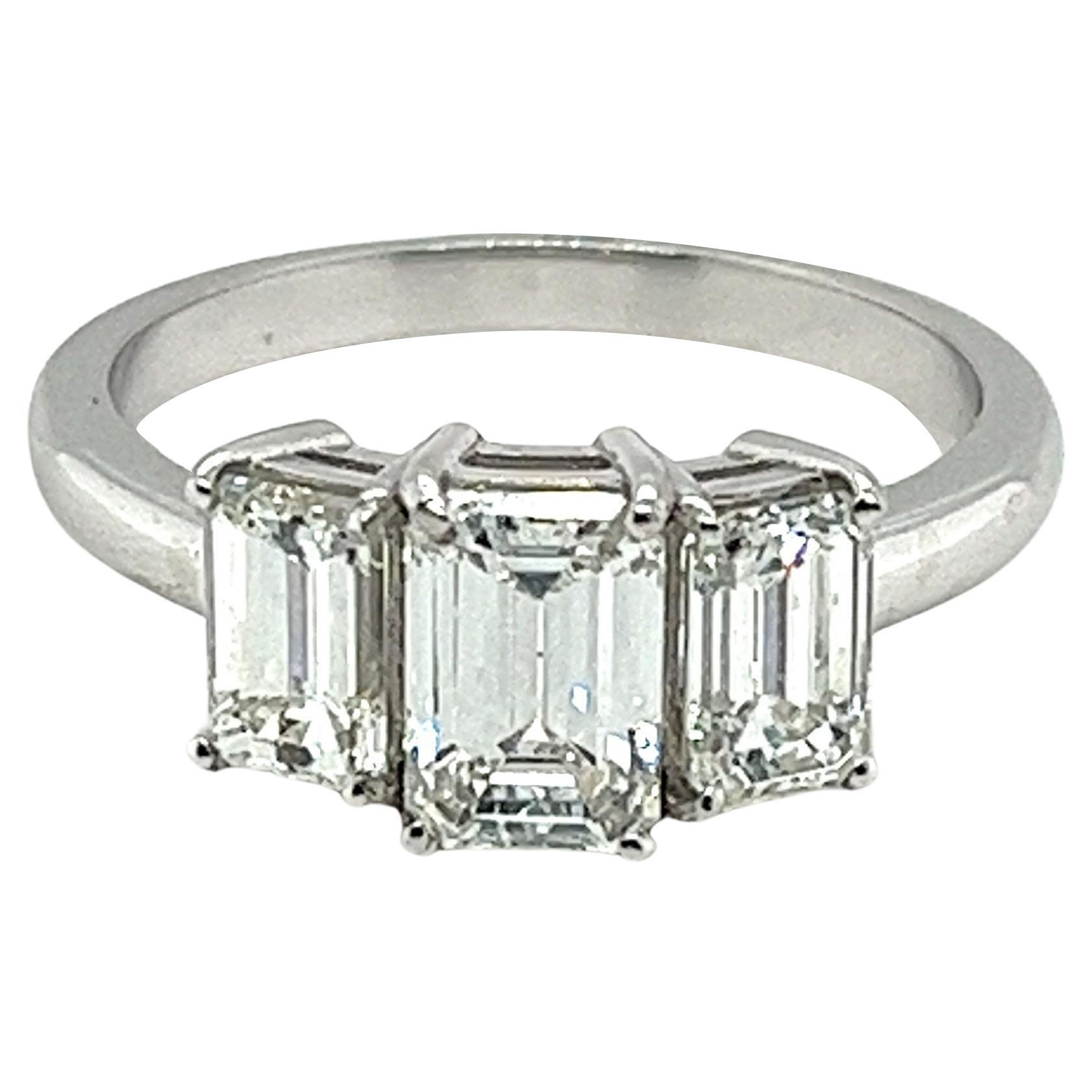 Platinum 3 Stone Emerald Cut 2.25 Carats Diamonds Ring For Sale
