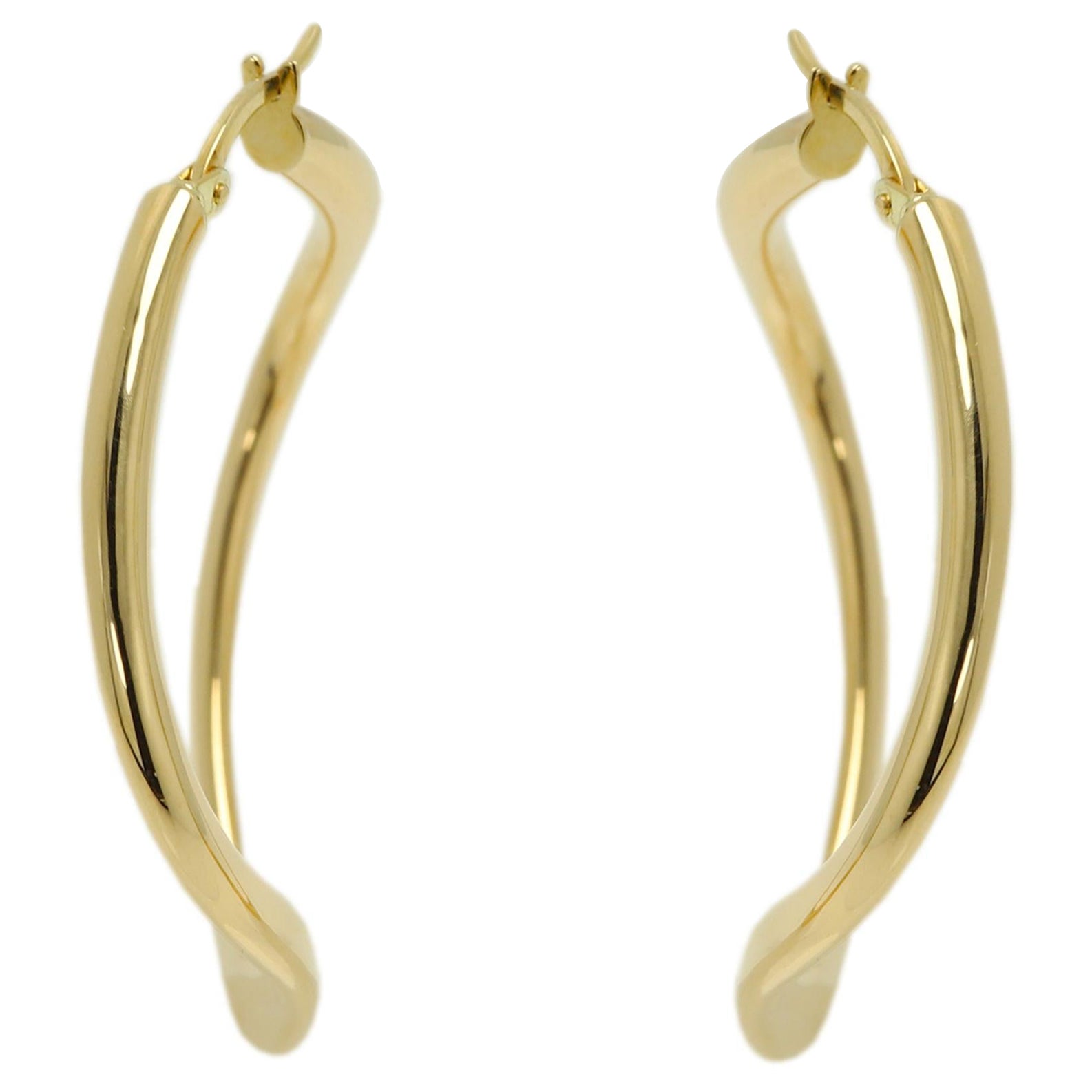 Made in Italy
Popular trendy Gold Hoops 
Ultimate Swirl and Curvy Shape - see the video
weight is 5.13 grams total.
14k Yellow Gold.
approx size: 35 mm
Standard Latch Back.
+Gift Box
(#5.13gr)
