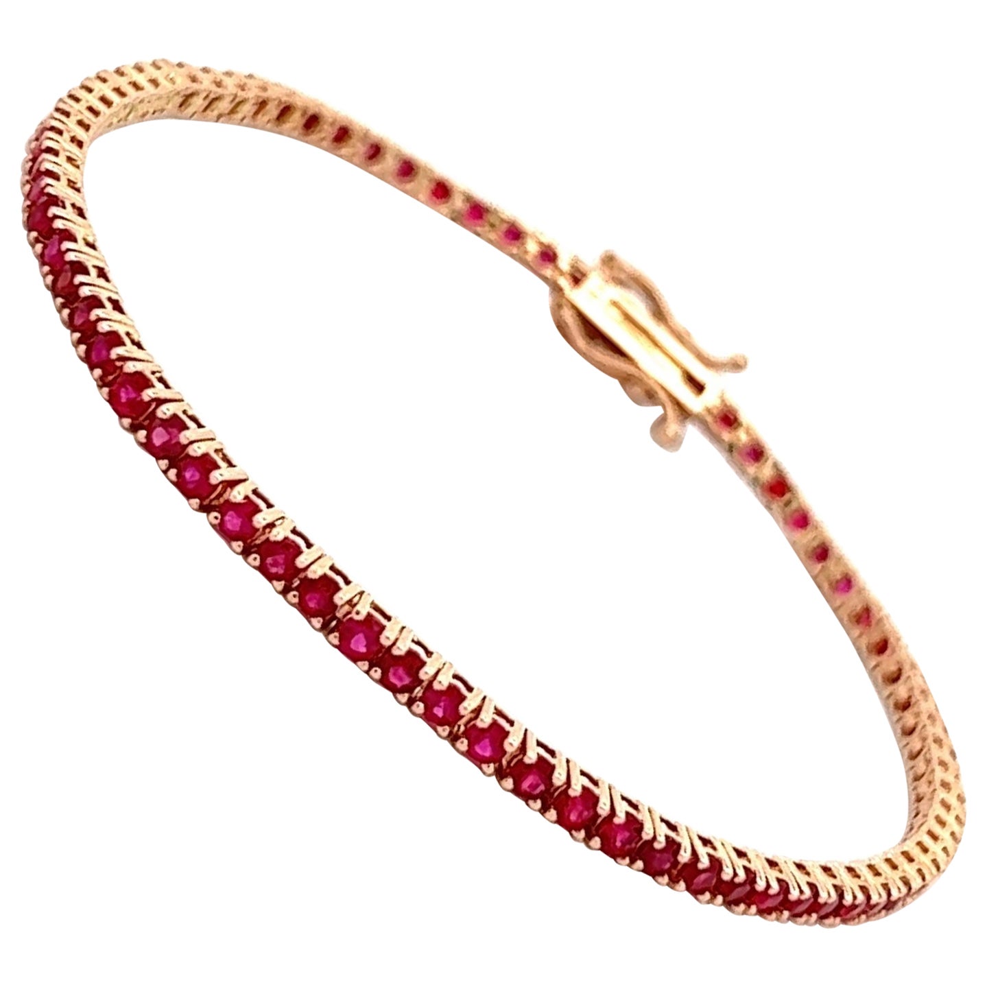 Natural Hot Red Rubies Tennis Bracelet in 14K Rose Gold, with 3.55 Carats Rubies.
Classic and everlasting Tennis Bracelet with 73 Natural Full Brilliant Cut Rubies.
14k Rose Gold
4 Prongs Setting
Number of Rubies: 73
Total Rubies Weight: 3.55 Carats