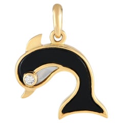 Van Cleef & Arpels Pendentif en or jaune 18 carats, diamants, onyx et nacre