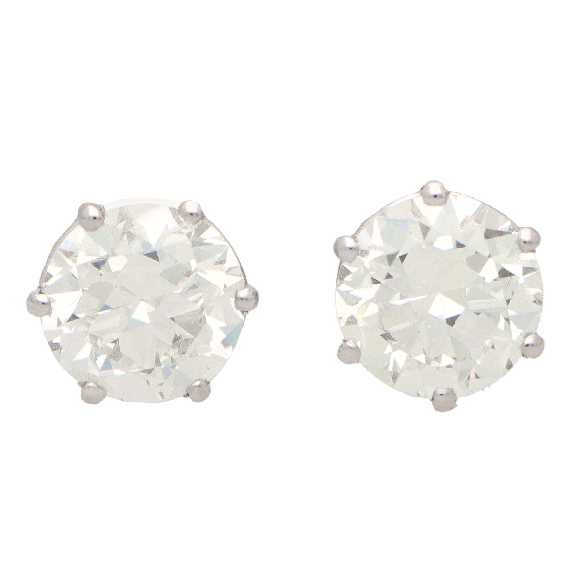 Certified 6.19ct Round Brilliant Cut Diamond Solitaire Stud Earrings in Platinum For Sale