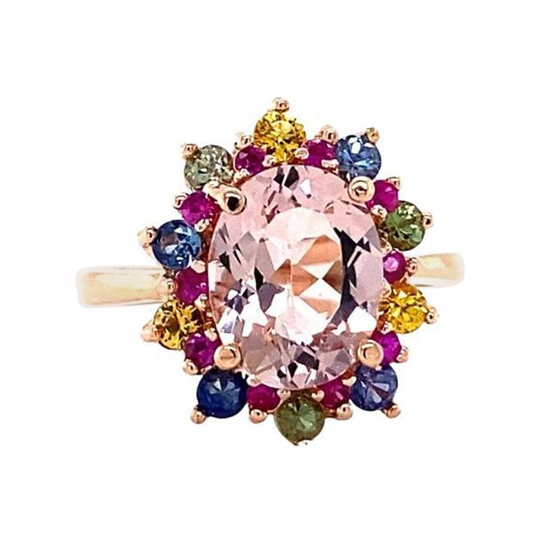 4.11 Carat Pink Morganite Multicolored Sapphire Cocktail Ring in 14K Rose Gold

Item Specs:

Pink Morganite (Oval Cut) = 2.28 carats
20 Multi-Color Sapphires & Pink Sapphires (Round Cut) = 0.90 carats
14K Rose Gold = 4.3 grams
Total Carat Weight =