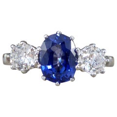 1.50 Carat Sapphire and 0.55 Carat Diamond Three Stone Ring in Platinum