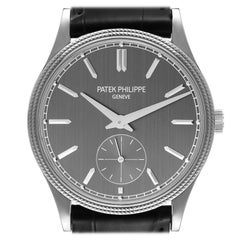 Patek Philippe Calatrava Montre homme or blanc bracelet noir 6119 Papers