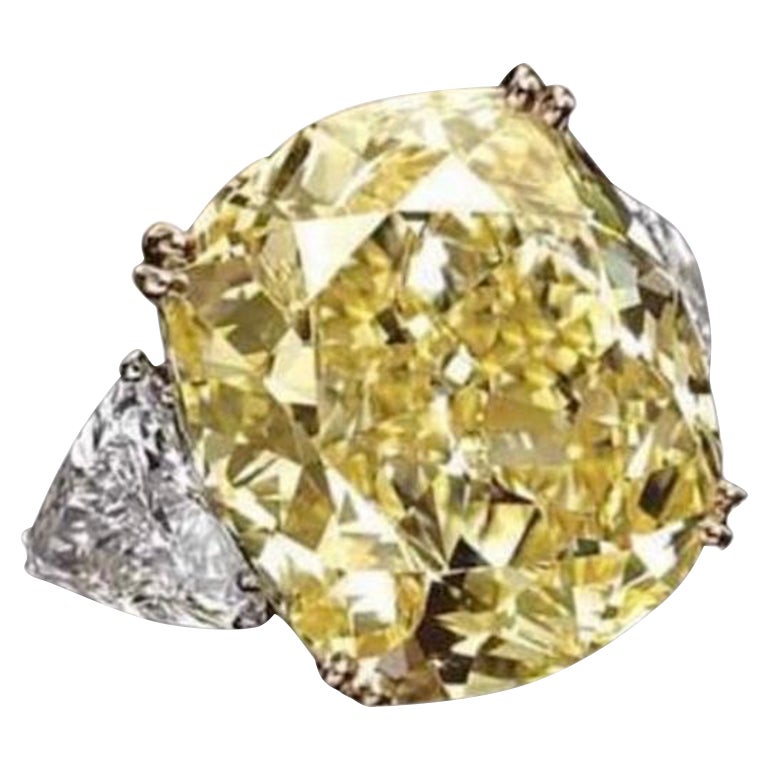 Amazing GIA Certified 5.01 Carats of Fancy Yellow Diamond on Ring  For Sale
