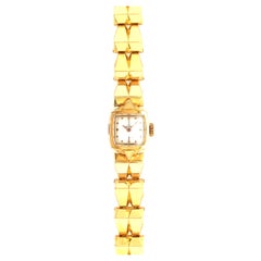 Omega, montre Tank vintage pour femmes avec cadran blanc cassé en or jaune 18 carats 