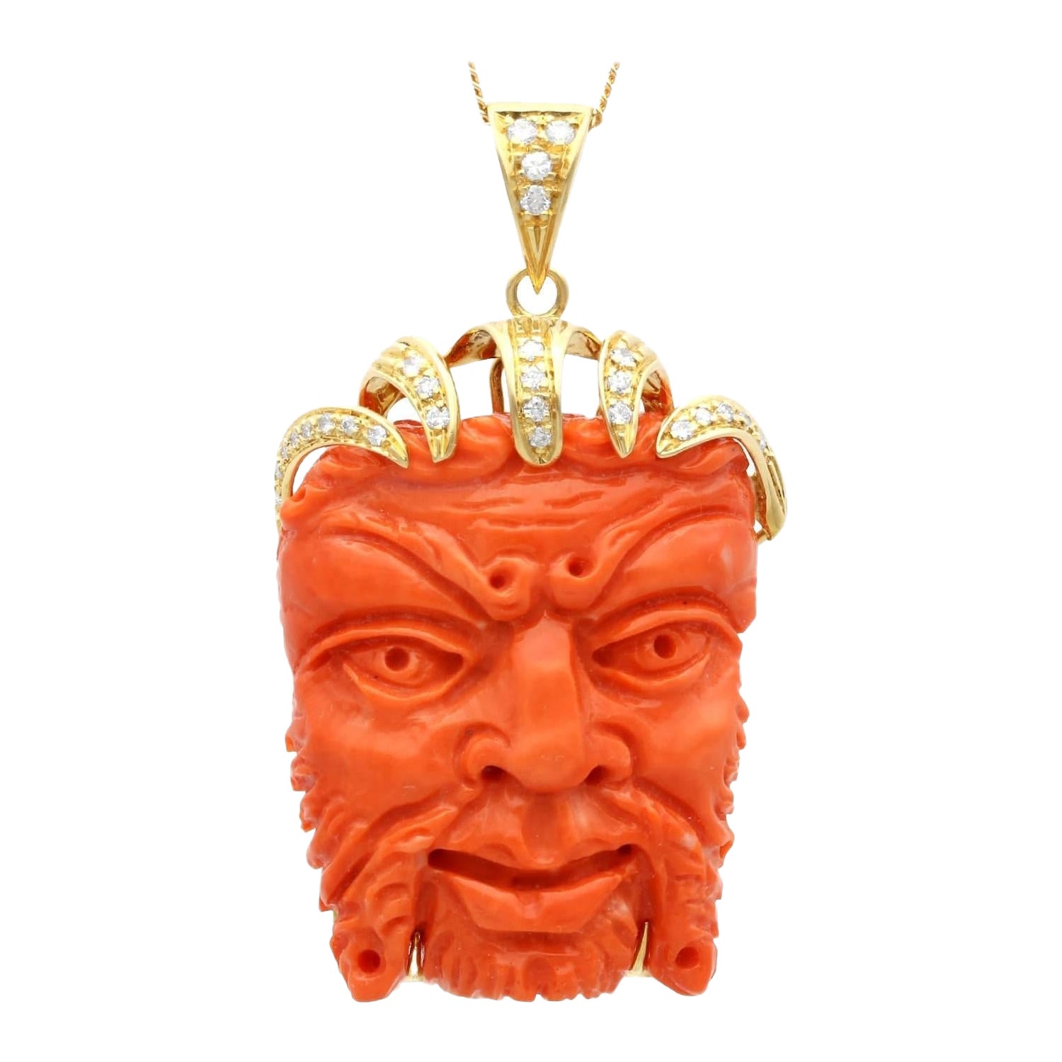 Vintage 112 Carat Coral and 0.29 Carat Diamond 18 Karat Yellow Gold Mask Pendant For Sale
