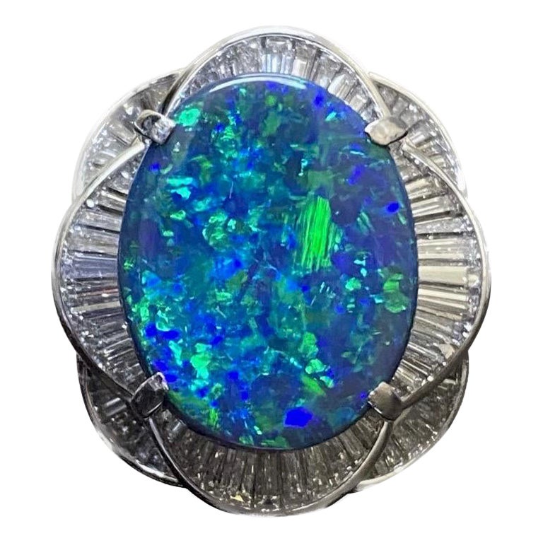 Platinum GIA Certified 6.78 Carat Lightning Ridge Black Opal Engagement Ring For Sale