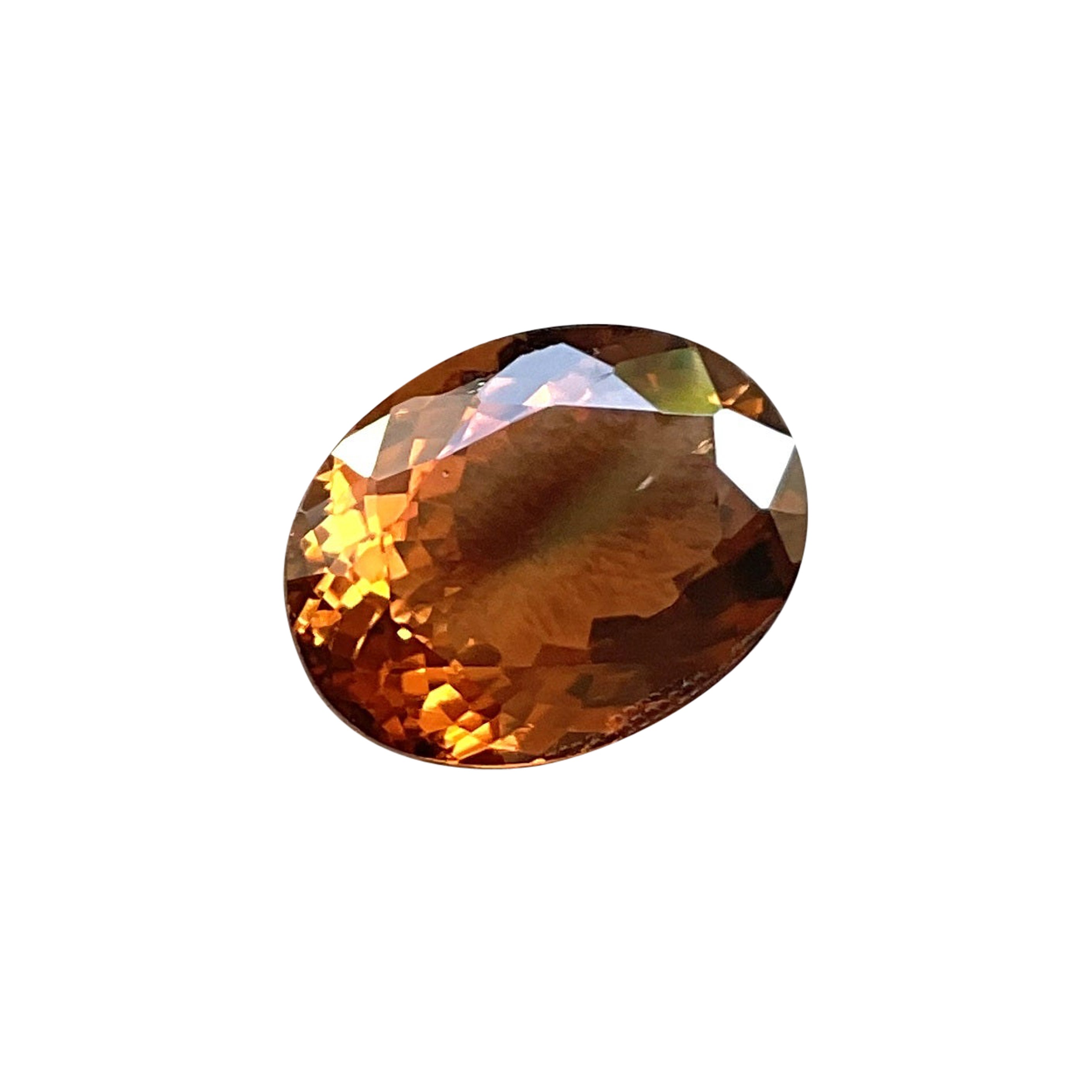 11.90 Carats Orange Brown Tourmaline Oval Faceted Cut Stone Natural Gemstone For Sale