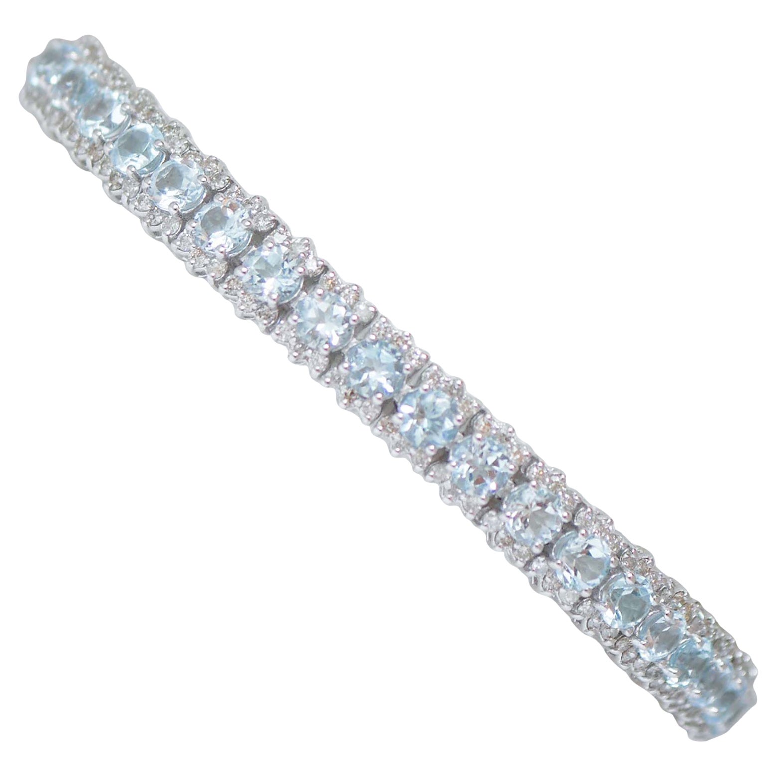 WHITE GOLD BRACELET WITH BAGUETTE AQUAMARINES AND ROUND DIAMONDS, .46 -  Howard's Jewelry Center